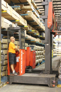 A man moving equipment representing distribution and logistics services provider Days Distribution & Logistics in Elkhart, IN