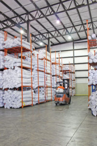 Shelves holding materials representing the services of logistics and distribution provider Days Distribution & Logistics in Elkhart, IN